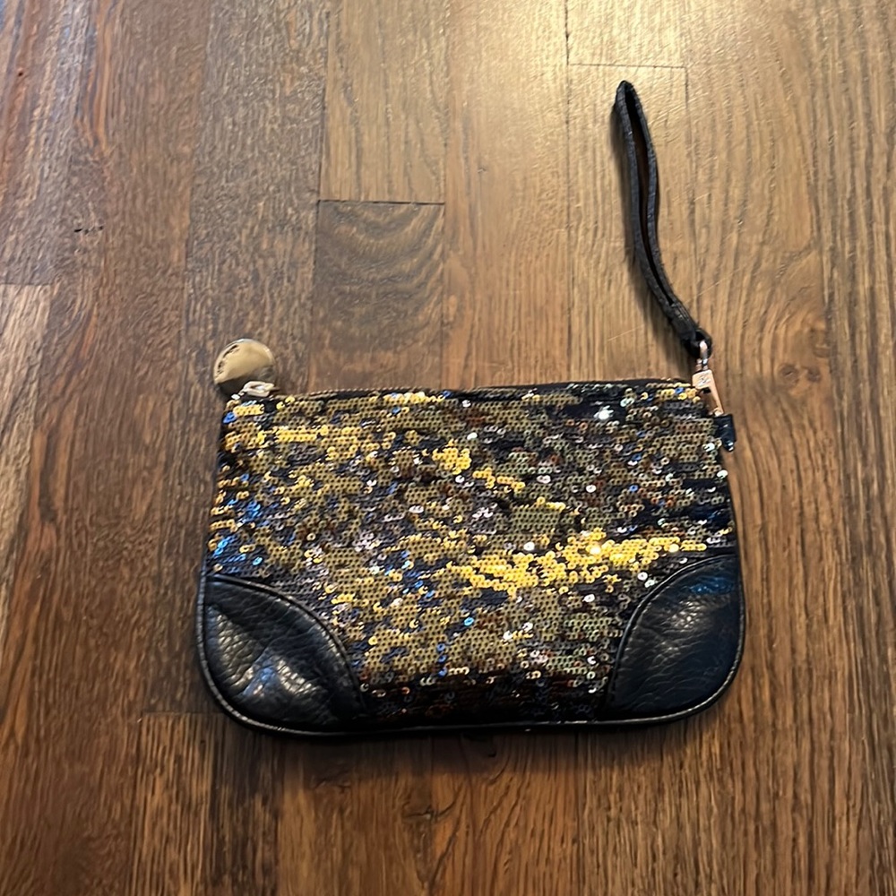 Black and gold sequined wristlet
